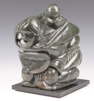 Jobie Ohaituk  (born 1946), a carved Inuit hardstone sculpture of a mother and child 31cm x 30cm x 16cm 