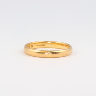 A 22ct yellow gold plain wedding band, size O,  3.5 grams  
