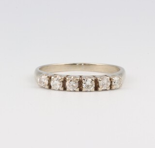 A 18ct yellow gold and diamond set half eternity ring, size L, 2.3 grams 