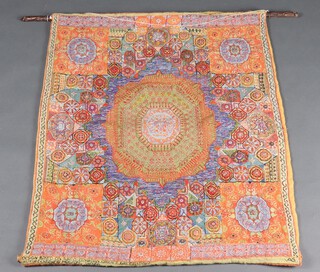 A copy of a design based on a 16th Century Turco-Egyptian carpet  mounted as a wall hanging 117cm x 95cm 