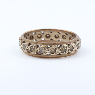 A  yellow gold testing as 9ct eternity ring set white stones, size N, 3 grams 