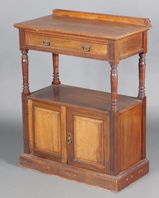 Maple & Company, a Victorian walnut buffet with raised back fitted a drawer above recess, the base enclosed by panelled doors, raised on a platform base 100cm h x 76cm w x 40cm d 