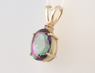 A 9ct yellow gold pendant set a green paste stone, 5.6 grams 