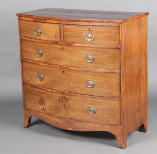 A 19th Century bleached mahogany bow front chest of 2 short and 3 long drawers with brass escutcheons and oval plate drop handles, raised on bracket feet 104cm h x 105cm w x 53cm d 