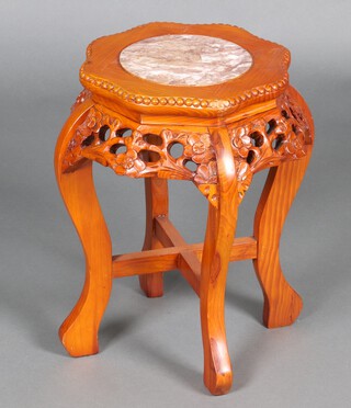A Chinese hardwood jardiniere stand with pink veined marble top, raised on cabriole supports 45cm h x 31cm diam. 