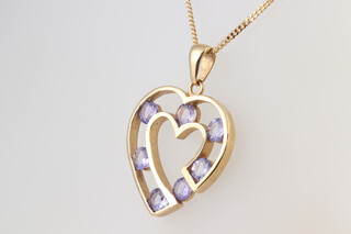A 9ct yellow gold and heart shaped amethyst pendant, hung on a 9ct gold chain 49cm, 7.7 grams gross 