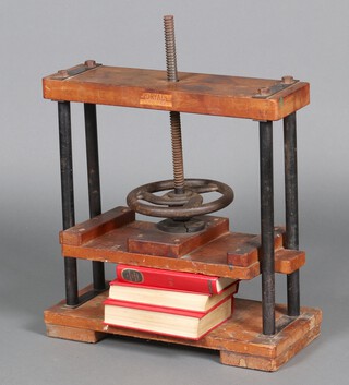 A 20th Century pine and metal book press 58cm h x 55cm w x 25cm d 