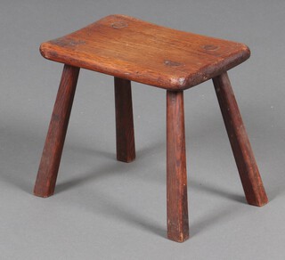 A rectangular elm stool, raised on turned supports, the base marked November 1940 25cm h x 27cm w x 19cm d 