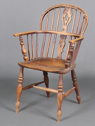 A 19th Century elm splat back Windsor chair with solid seat, raised on turned supports with H framed stretcher 91cm h x 58cm w x 37cm d 