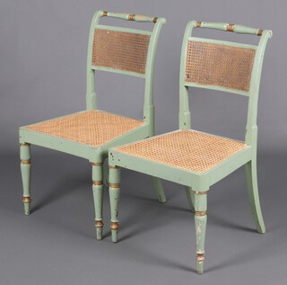A pair of French 19th Century turquoise painted standard chairs with woven cane seats and backs, raised on turned supports 85cm h x 46cm w x 42cm d 