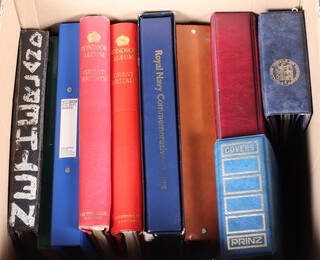 A collection of empty stamp albums 