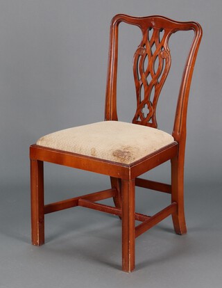 A Chippendale style open arm chair with pierced vase shaped slat back and upholstered drop in seat, raised on square tapered supports 91cm h x 51cm w x 45cm d 