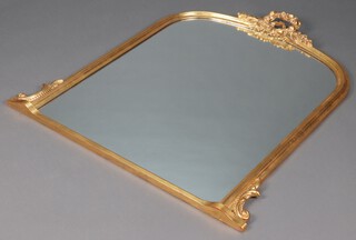 A Victorian style arched plate over mantel mirror contained in a gilt frame surmounted by a wreath garland 122cm x 107cm 