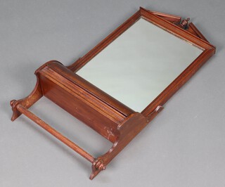 A Victorian rectangular plate wall mirror contained in a mahogany frame, the base incorporating a fitted box and  towel rail 83cm x 42cm x 15cm  