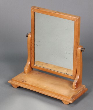A Victorian rectangular plate dressing table mirror contained in a bleached mahogany frame 53cm x 49cm x 21cm 