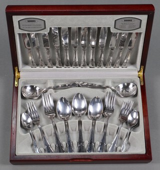Viners, a 44 piece canteen of chromium plated flatware - 6 dinner knives, 6 dinner forks, 6 soup spoons, 6 tea spoons, 3 dessert spoons and 3 dessert forks, 2 serving spoons, all contained in a walnut canteen  