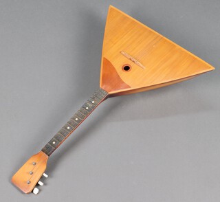 A Russian 3 stringed balalaika 