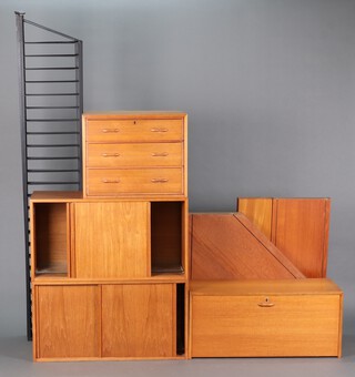 Ladderax, a mid-century range of shelving, including 7 metal uprights, chest of 3 drawers 47cm x 59cm x 40cm d, 2 cabinets enclosed by sliding panelled doors 47cm x 89cm w x 40cm d, cocktail unit with fall front 47cm h x, 9 rectangular shelves and 3 corner shelves 