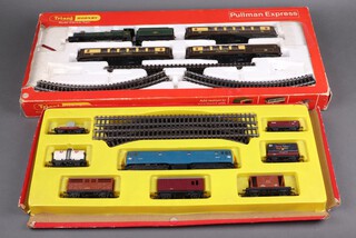 A Triang Hornby OO gauge RS90 Pullman Train Set with locomotive and carriages together with a Hornby train set comprising double headed diesel locomotive and 7 seven items of rolling stock 