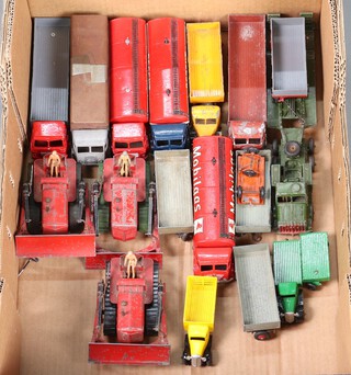 Three Dinky Super Toys Blaw Nox bulldozers, 2 ditto Foden Oil Tankers, a Leyland Octopus Open Lorry and other Dinky Toys models, all contained in a fruit box 