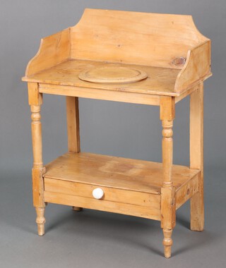 A Victorian pine wash stand with 3/4 gallery, raised on turned supports 97cm h x 72cm w x 40cm d (signs of old but treated worm in places) 