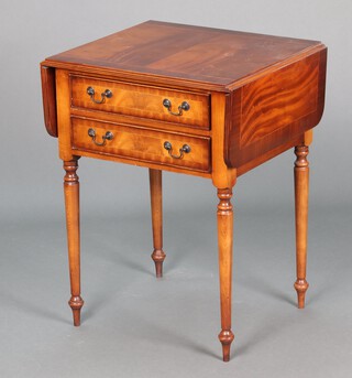 A reproduction Victorian inlaid and cross banded mahogany drop flap table, raised on turned supports 70cm h x 52cm x 47cm