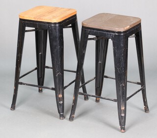 A pair of metal and pine stacking stools 67cm h x 31cm w x 31cm d 
