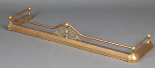 A brass railed fire curb 18cm h x 130cm w x 36cm d 