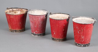 Four metal painted fire buckets