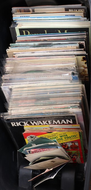 A large collection of 1970's and 80's vinyl LP album records including The Animals, Deep Purple, Blondie, Paul Simons, Tina Turner, etc 