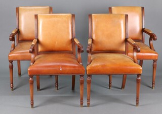 A set of 4 Georgian style mahogany open armchairs, the seats and backs upholstered in leather 95cm h x 57cm w x 54cm d (water marks to the seats) 