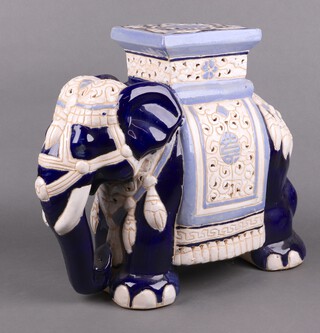 A blue pottery garden seat in the form of an elephant 45cm 