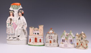 Two 19th Century Staffordshire pastel burners in the form of cottages 11cm and 12cm (restored), a Staffordshire flat back figure in the form of a folly 17cm (chip to base), ditto cottage money box 14cm (restored) and a ditto vase decorated a seated lady and gentleman with a dog (restored) 