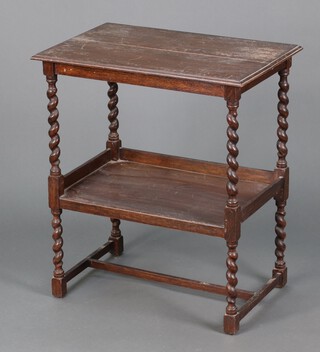 A 1930's rectangular oak 2 tier trolley on spiral turned supports 74cm h x 64cm w x 42cm (split to top, no wheels)