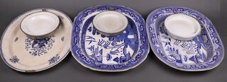 Two 19th Century blue and white Willow pattern meat plates (1 with chips, 1 with contact marks), 1 other (chipped and crazed) and 3 nursery warming plates 