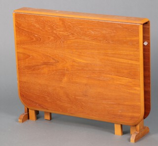 A mid-century teak drop flap gateleg dining table 74cm h x 90cm w x 9cm 