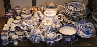 Five blue and white Willow pattern teapots, ditto tureen and cover, egg cups and other items of blue and white Willow pattern china 