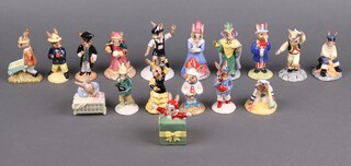Sixteen Royal Doulton Bunnykins figures - Flamenco Dancer, Fortune Teller, Morris Dancing, Fisherman, Uncle Sam, Mystic, Tyrollean Dancer, New Baby, Sundial, Santa's Helper, Boy Skater, Sailor, Gardener, Fireman, Rocket Man, Boy Skater and School Master 