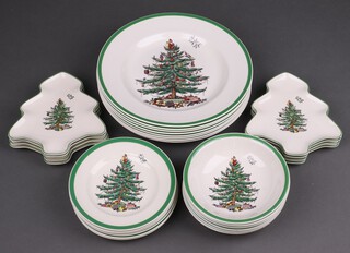 A Spode 28 piece Christmas Tree pattern service comprising 8 Christmas tree shaped dishes, 8 plates, 6 tea plates, 6 dessert bowls and a similar Christmas tree shaped serving dish boxed  