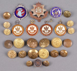 An East Surrey Regiment cap badge, 2 Southern Railway buttons and other buttons 