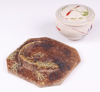 An Art Pottery tile/plaque decorated a lizard, the reverse impressed HN 15cm together with a Japanese style Art Pottery jar and cover with floral decoration 7cm 