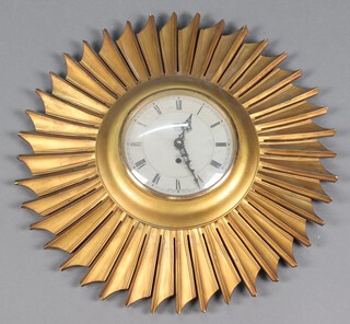 A Smiths 1950's 8 day clock with silvered dial, Roman numerals, contained in a gold painted sunburst case 43cm, converted to battery 