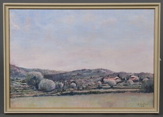 J Jullick, oil on canvas, rural scene with buildings and hills in distance, signed and dated '83,  38cm x 54cm