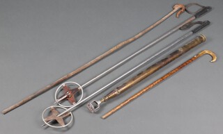 A Peter Carmichael & Co. The Grange "Kill Weeder", 2 metal ski poles and 2 walking sticks 
