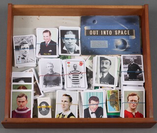 An album of Brook Bond tea cards "In To Space" and a collection of restrike cigarette and trade cards