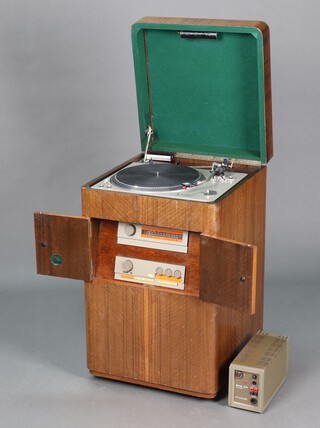 A Quad Hi-Fi system comprising 303 power amplifier, Quad 33 amplifier, Quad FM3 tuner together with a Technics SL-1500 turn table, all in a custom fitted walnut cabinet (untested and not guaranteed to be working) 