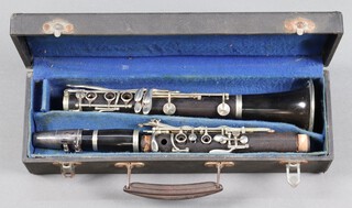 A clarinet marked A1 Couture Paris, cased