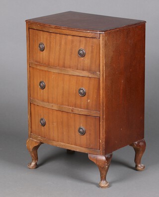A mahogany bow front chest of 3 long drawers raised on cabriole supports 69cm h x 43cm w x 34cm d 