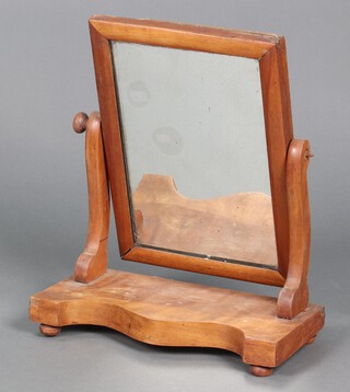 A Victorian rectangular mahogany dressing table mirror contained in a mahogany swing frame, the base of serpentine outline 44cm h x 36cm w x 17cm d 