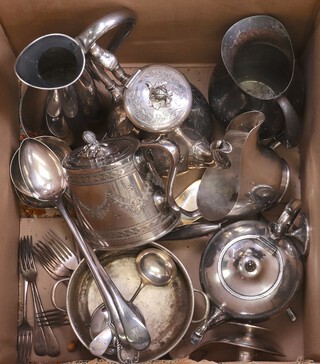 An oval Britannia metal teapot, a ditto coffee pot, silver plated jug and sauce boat, 2 ladles and other plated items 